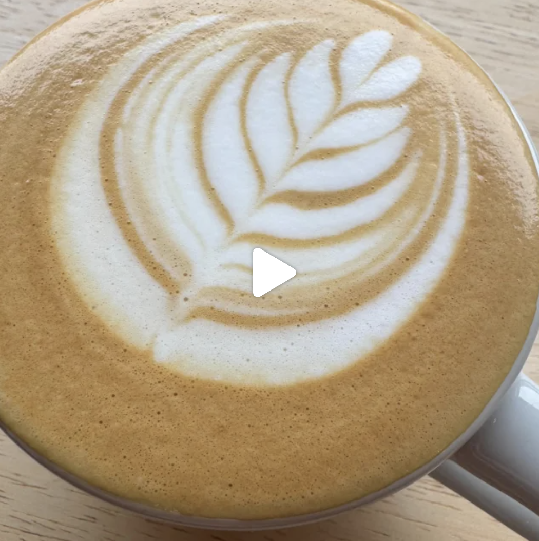 Close-up of latte art rosetta.